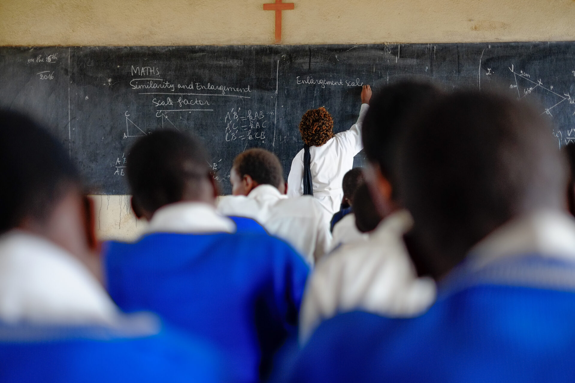 Teacher,and,pupils,at,mathematics,lesson,in,a,classroom,in